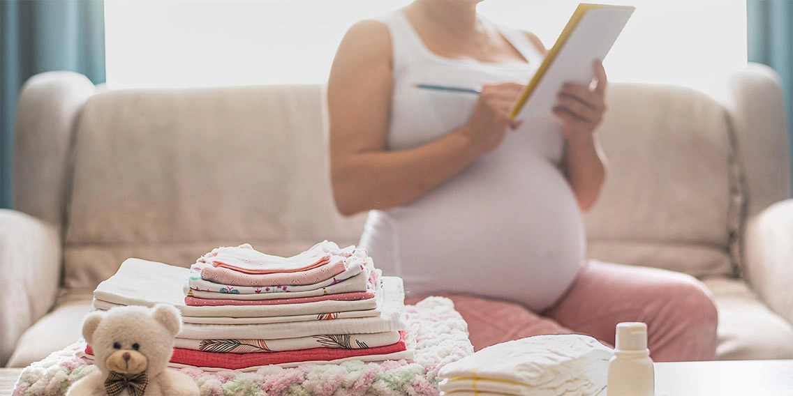 mother preparing finances for baby