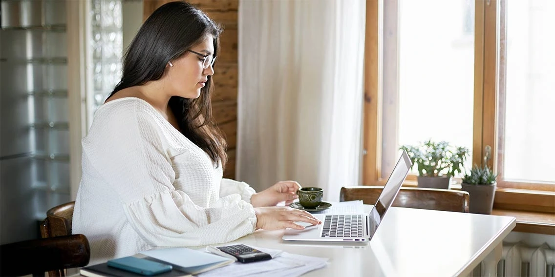 woman researching personal loan basics