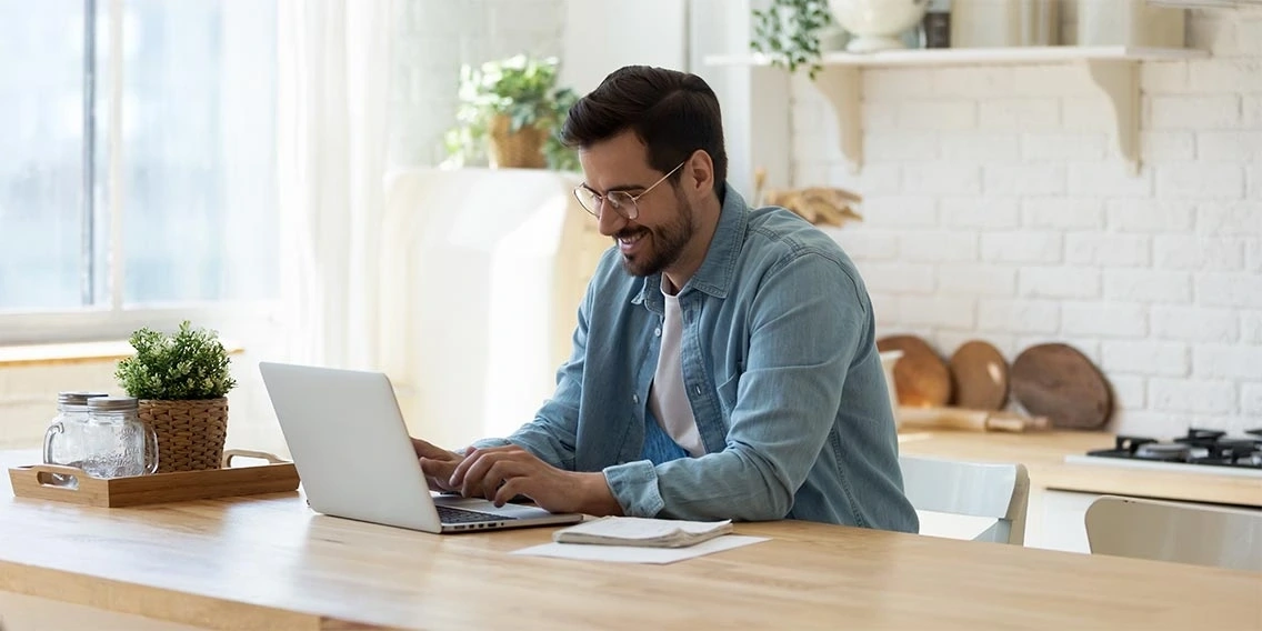 A man researching personal loans