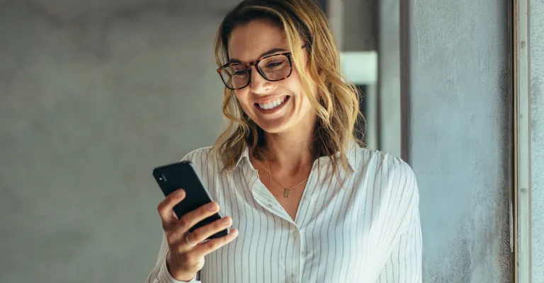 a woman looking at the phone