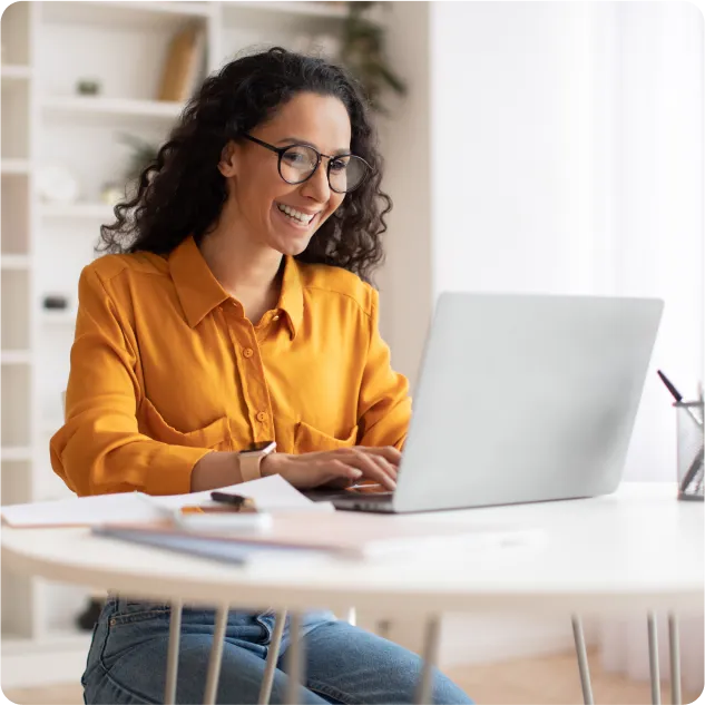 a woman working on the laptop