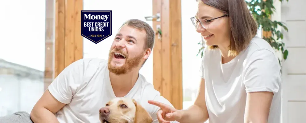 couple with their pet dog