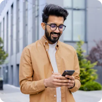 Man interacting with mobile phone